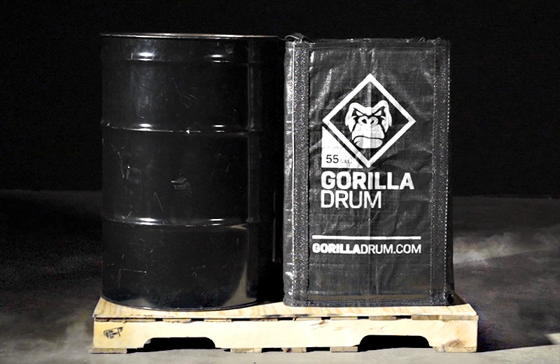Gorilla Drum on a pallet next to traditional steel drum